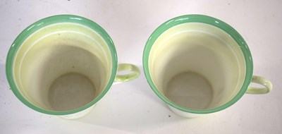 Lot 73 - Two Shelley Art Deco cups and saucers with...