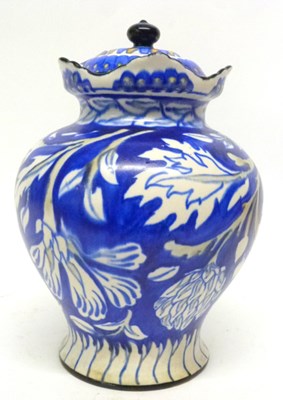Lot 87 - Deco vase and cover, the blue ground with...