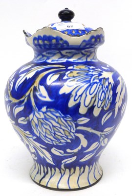 Lot 87 - Deco vase and cover, the blue ground with...