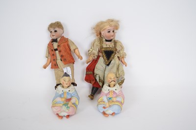 Lot 102 - Pair of Oriental ceramic nodding dolls,...