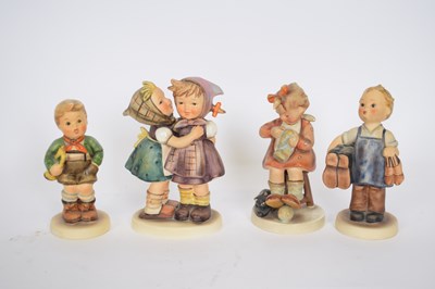 Lot 110 - Group of four Goebel figures of children,...