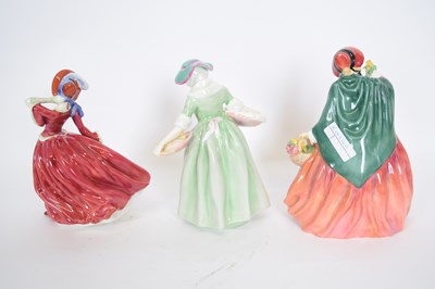 Lot 143 - Group of three Royal Doulton figures...