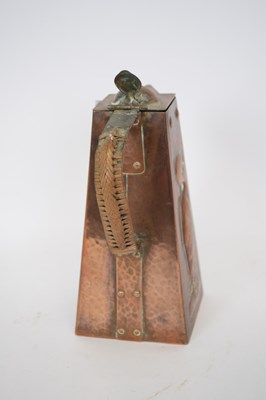 Lot 185 - Newlyn School copper jug with wicker handle