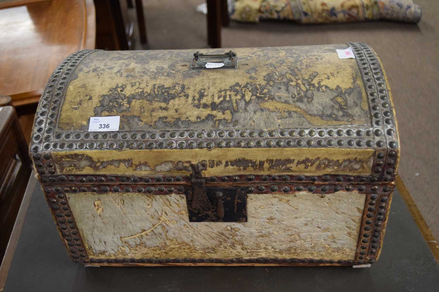 Lot 336 - Small 18th/19th century dome top trunk covered...