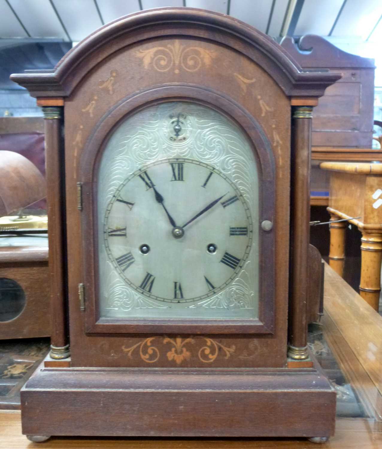 Lot 383 Edwardian mantel clock in arched mahogany