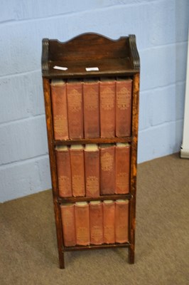 Lot 397 - Small oak bookcase containing a set of Charles...