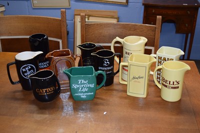 Lot 402 - Collection of 11 various Wade pub jugs with a...