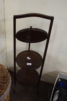 Lot 705 - MAHOGANY FOLDING CAKE STAND