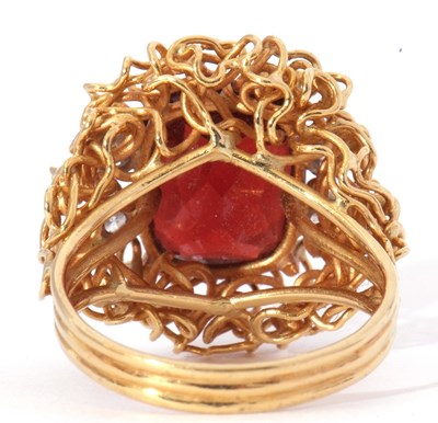Lot 5 - Modern garnet and diamond ring, the central...