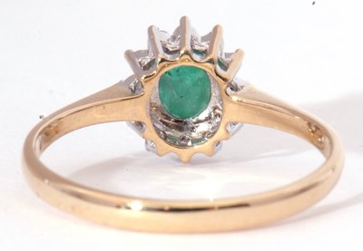 Lot 13 - Modern emerald and diamond cluster ring,...