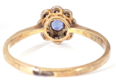 Lot 18 - Sapphire and diamond cluster ring, the round...