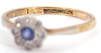 Lot 18 - Sapphire and diamond cluster ring, the round...