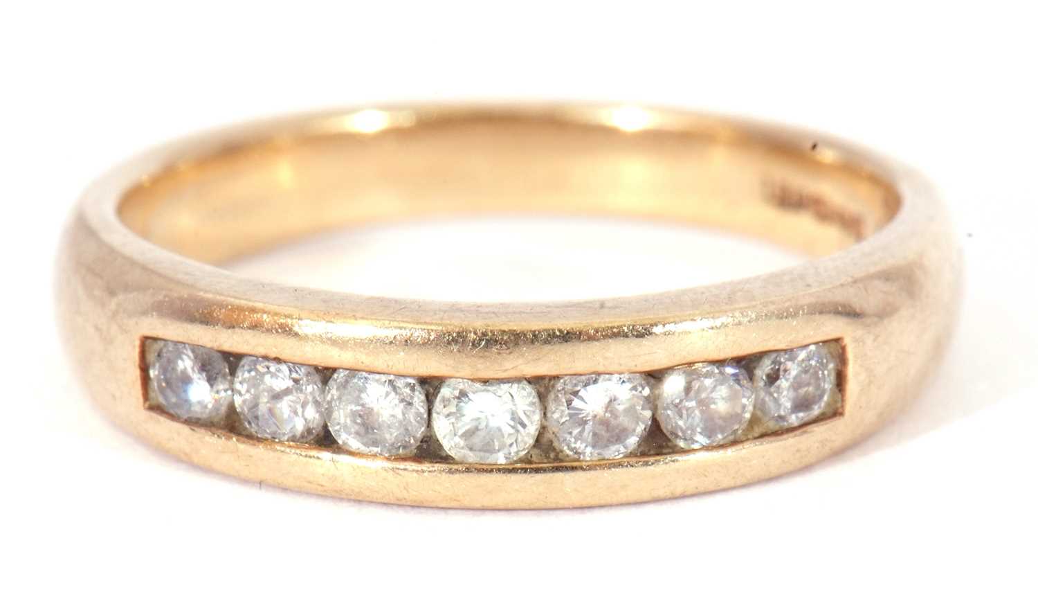 Lot 20 - 9ct gold and diamond half hoop ring featuring...