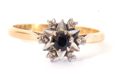 Lot 38 - 18ct gold sapphire and diamond ring centring a...