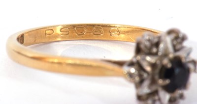 Lot 38 - 18ct gold sapphire and diamond ring centring a...
