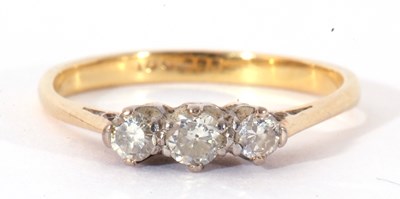 Lot 42 - Three stone diamond ring featuring three...