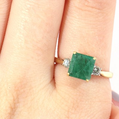 Lot 48 - 18ct gold emerald and diamond ring, the square...
