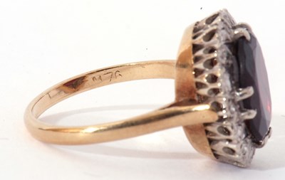 Lot 75 - Modern 9ct gold garnet and diamond ring, the...
