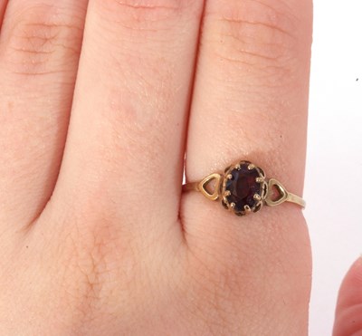 Lot 76 - 9ct gold garnet ring, multi-claw set and...