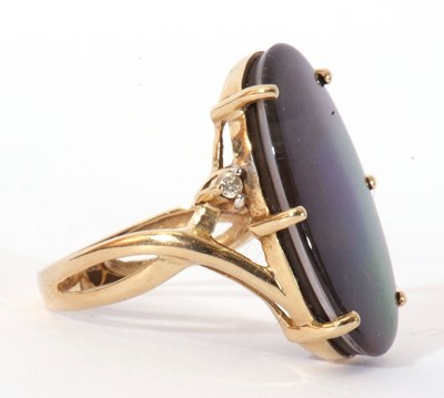 Lot 86 - Modern 9ct gold iridescent stone dress ring,...