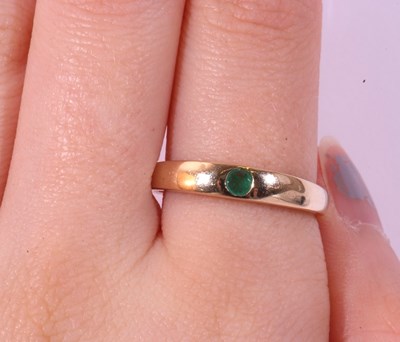 Lot 111 - Modern 9ct gold single stone emerald ring, the...