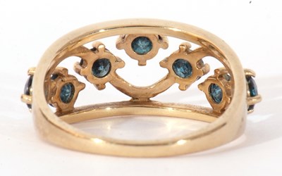 Lot 113 - Modern 9ct gold and blue stone ring, the open...