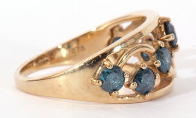 Lot 113 - Modern 9ct gold and blue stone ring, the open...