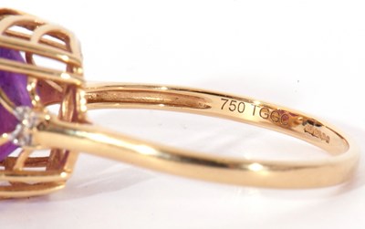 Lot 116 - Modern 18ct gold, amethyst and diamond ring,...