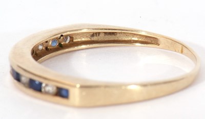 Lot 119 - Modern 9ct gold sapphire and diamond half hoop...