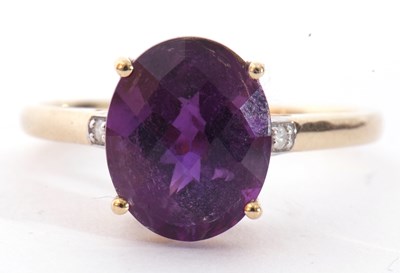Lot 120 - Modern 9ct gold amethyst and diamond ring, the...
