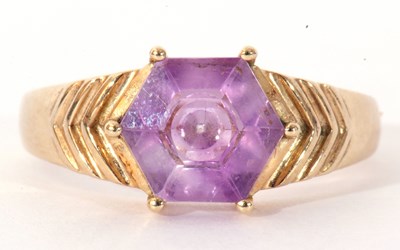 Lot 122 - Modern 9ct gold and purple crystal ring, the...