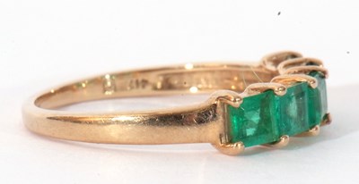 Lot 123 - Modern 9ct gold and emerald ring set with five...