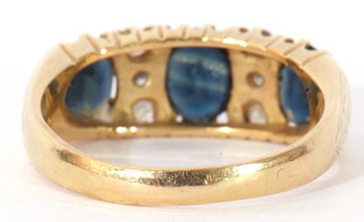Lot 153 - Sapphire and diamond ring featuring three...