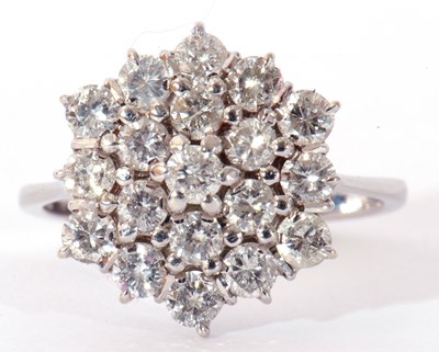 Lot 159 - Diamond cluster ring, a three tier design...