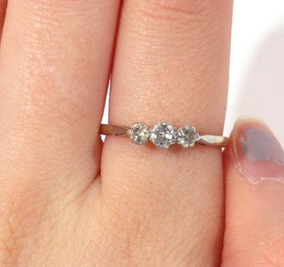 Lot 160 - Three stone diamond ring set with three...