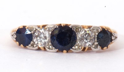 Lot 163 - Sapphire and diamond ring featuring three...