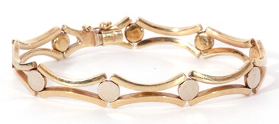 Lot 193 - Modern 9ct gold bracelet, a stylised 'X' bar...