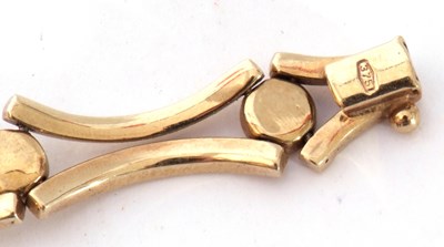 Lot 193 - Modern 9ct gold bracelet, a stylised 'X' bar...