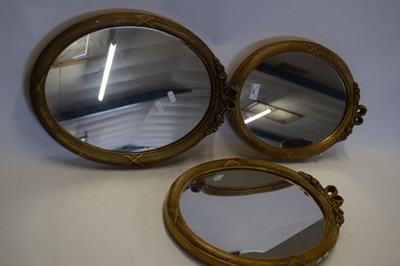 Lot 144 - THREE 20TH CENTURY OVAL WALL MIRRORS IN GILT...