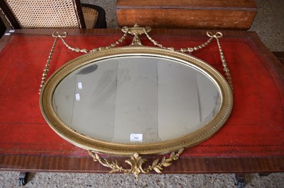 Lot 343 - OVAL BEVELLED WALL MIRROR SET IN A FRAME WITH...