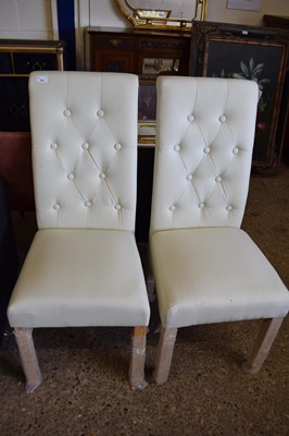 Lot 384 - PAIR OF CREAM BUTTON UPHOLSTERED DINING CHAIRS