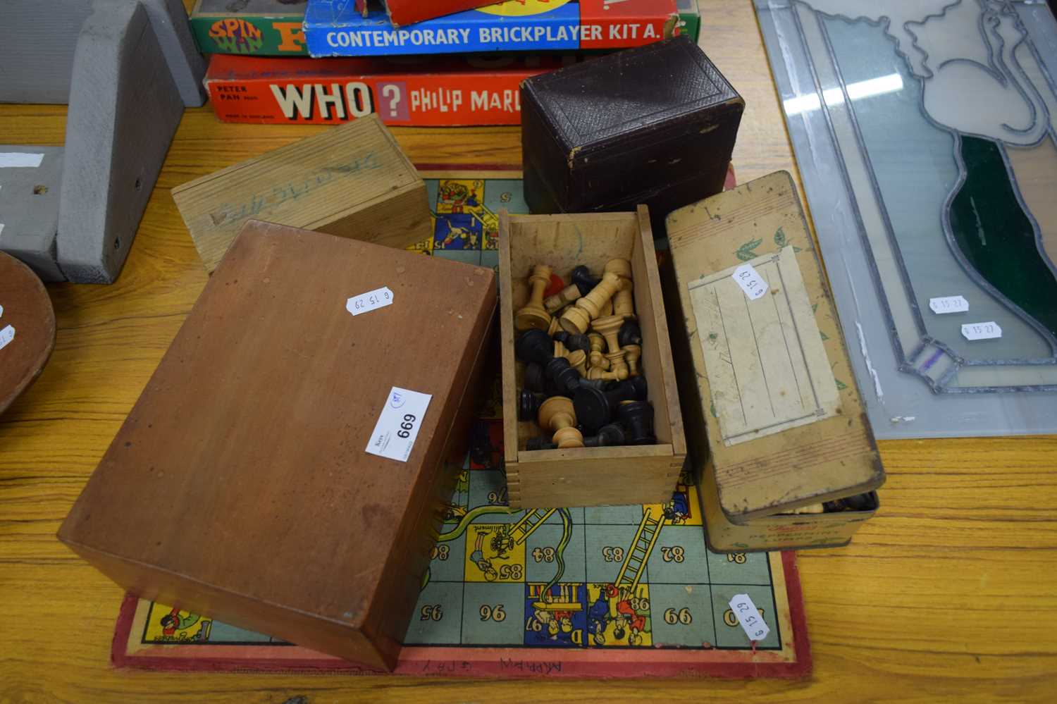 Lot 669 THREE BOXES CONTAINING CHESS PIECES, A BOX