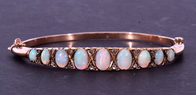 Lot 224 - Antique opal and diamond hinge bracelet, the...