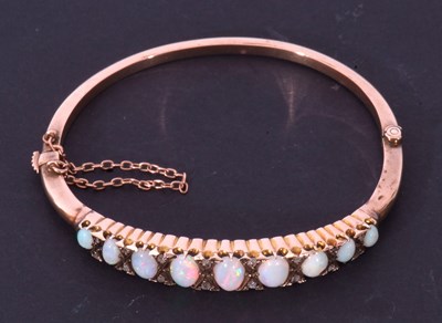 Lot 224 - Antique opal and diamond hinge bracelet, the...