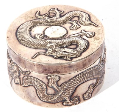 Lot 34 - Chinese white metal circular box with pull off...
