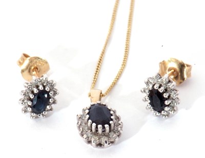 Lot 296 - Modern 9ct gold, sapphire and diamond pendant...