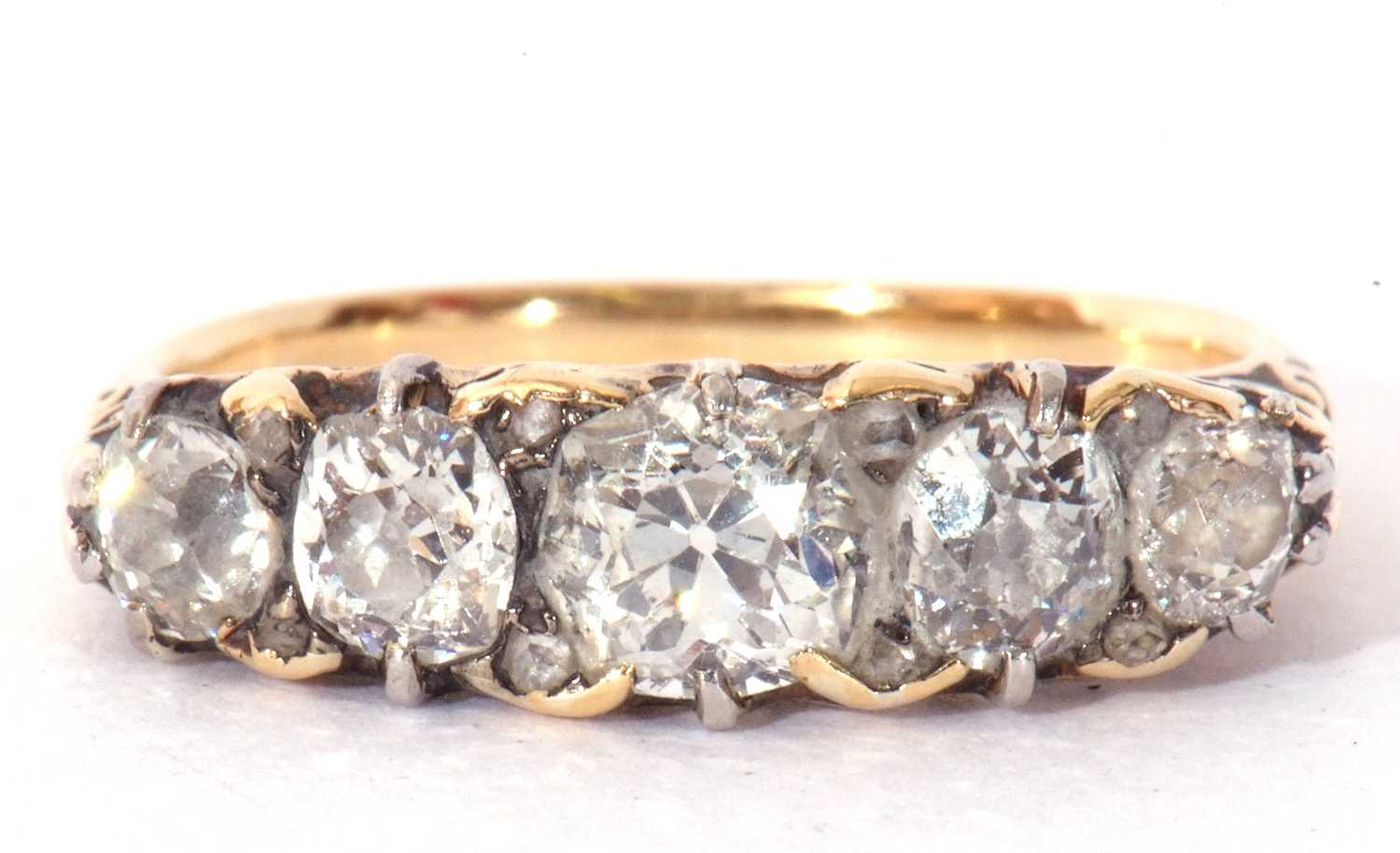 Lot 27 - Five stone diamond ring featuring five...