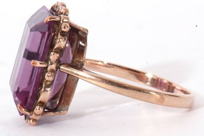 Lot 126 - Synthetic spinel dress ring of rectangular cut,...