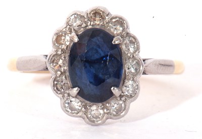 Lot 146 - Sapphire and diamond ring, the oval cut...