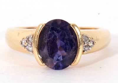 Lot 151 - Modern Iolite and diamond dress ring, the oval...